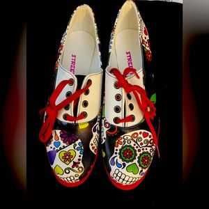 Never worn. Sugar skull flats.